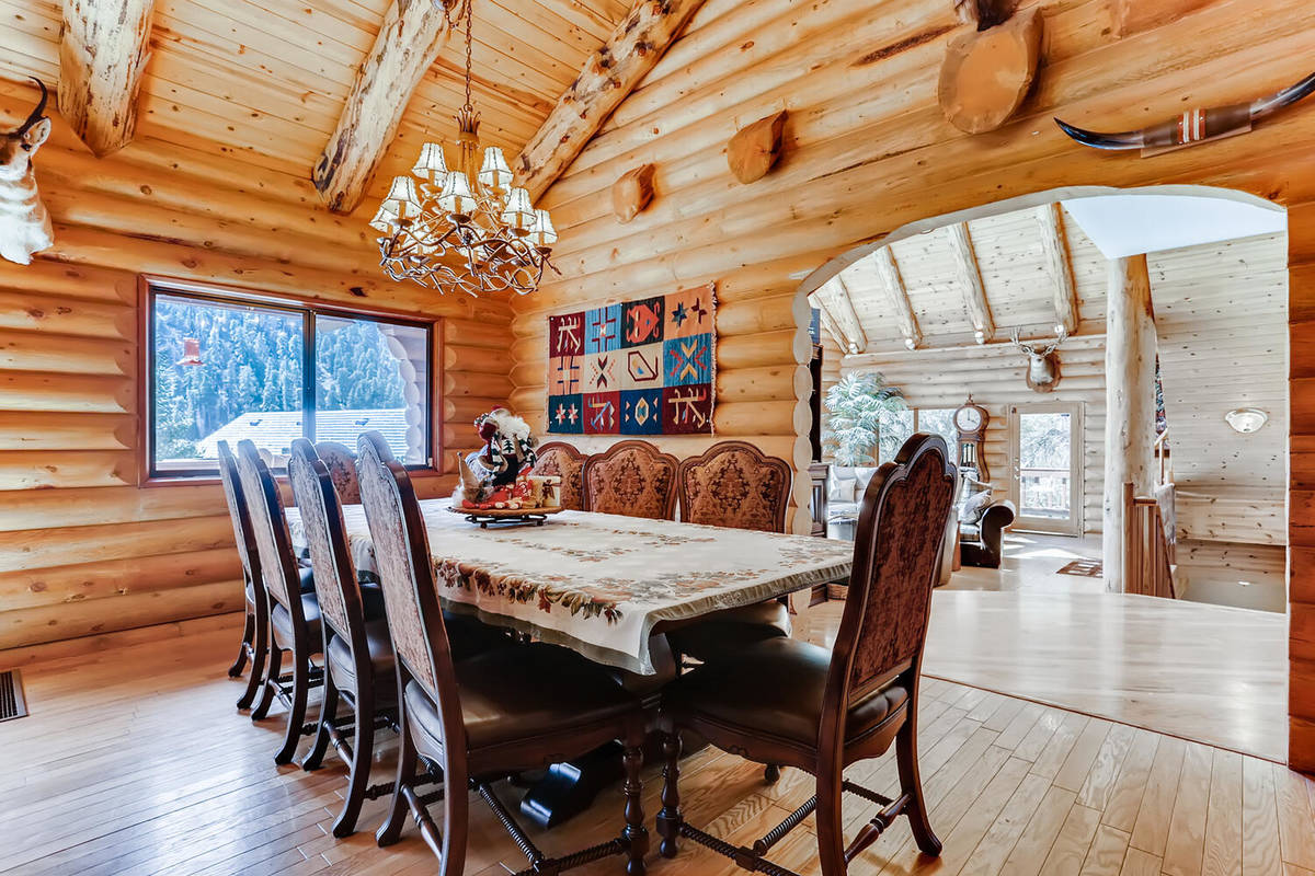 Mt. Charleston Realty The Mount Charleston cabin at 261 Kris Kringle Road has a large dining room.