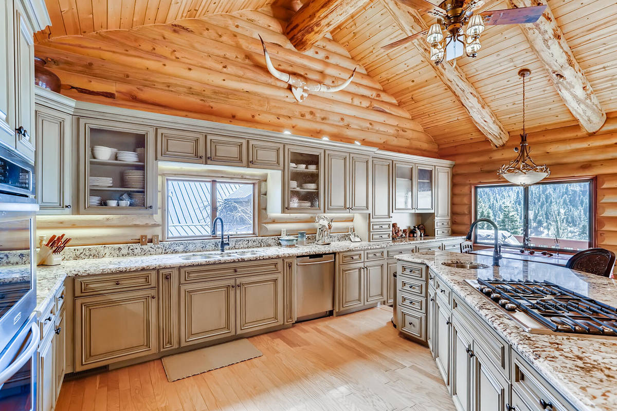 Mt. Charleston Realty Professional-grade stainless appliances — including a large built-in re ...