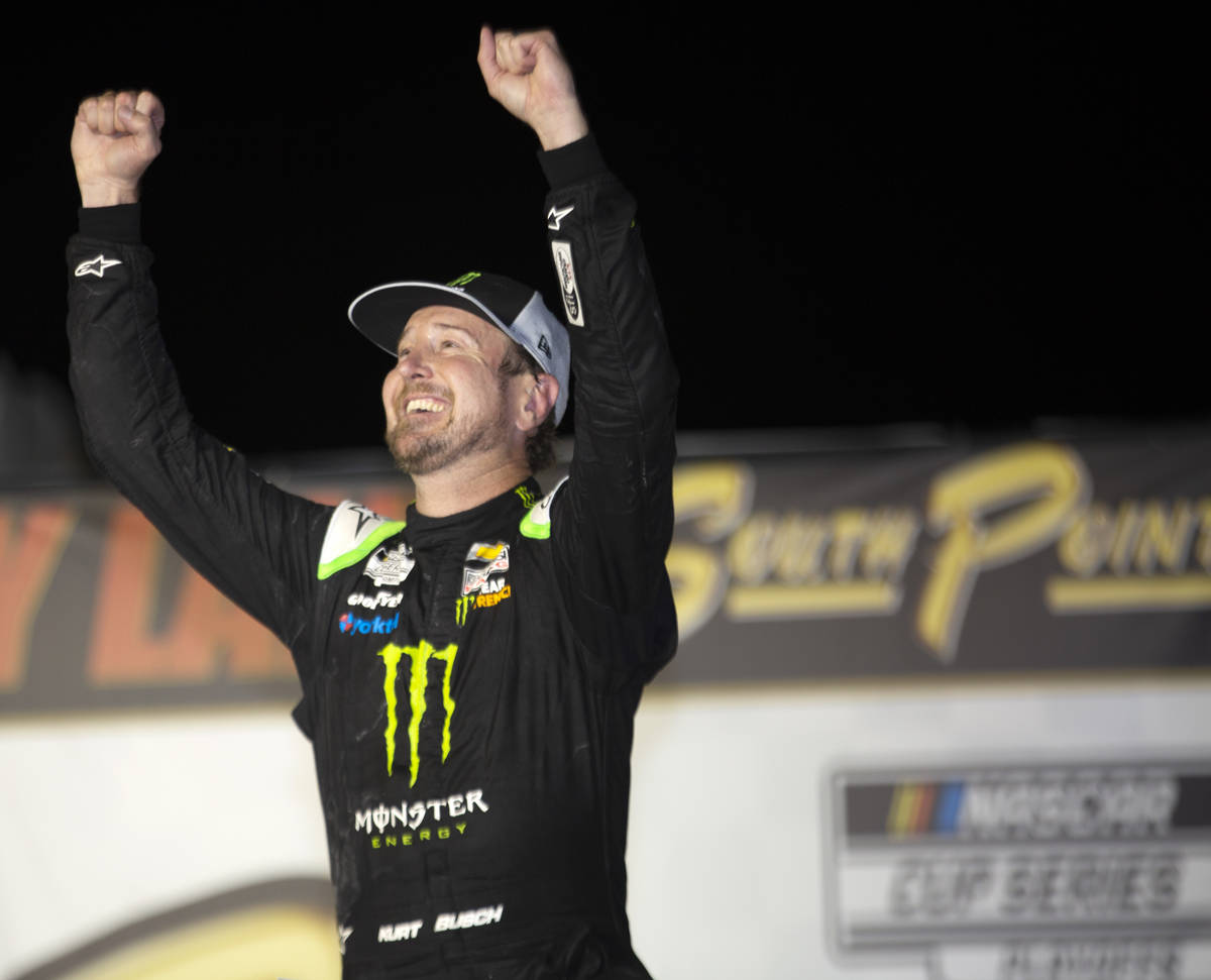 Kurt Busch (1), of Las Vegas, celebrates in Victory Lane after a NASCAR Cup Series auto ra ...