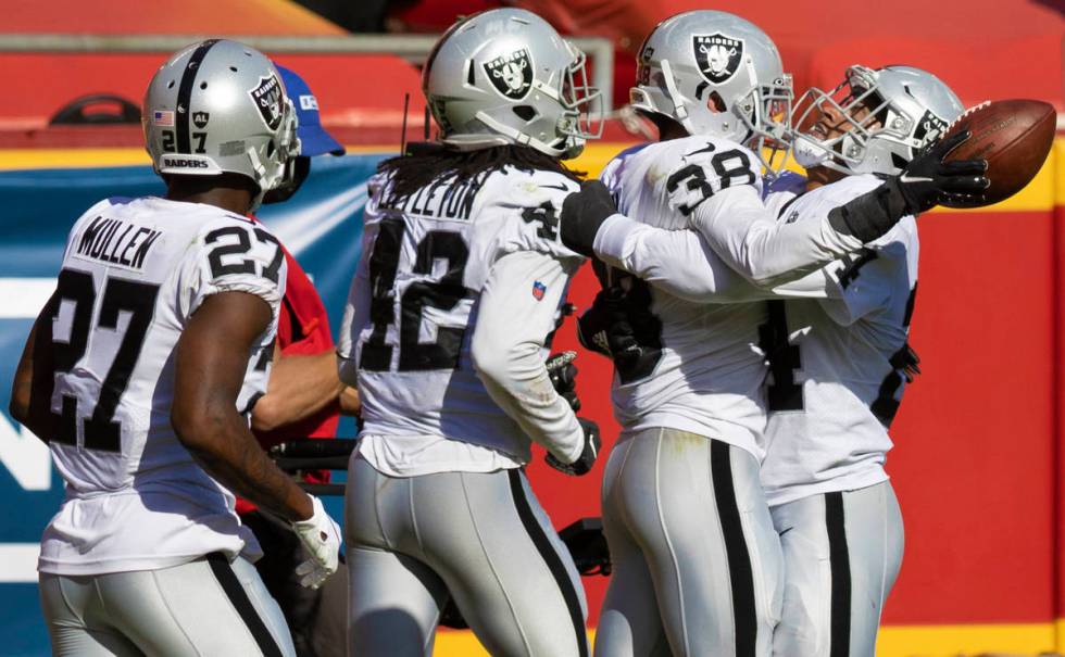 Las Vegas Raiders strong safety Jeff Heath (38) celebrates with Las Vegas Raiders cornerback Tr ...