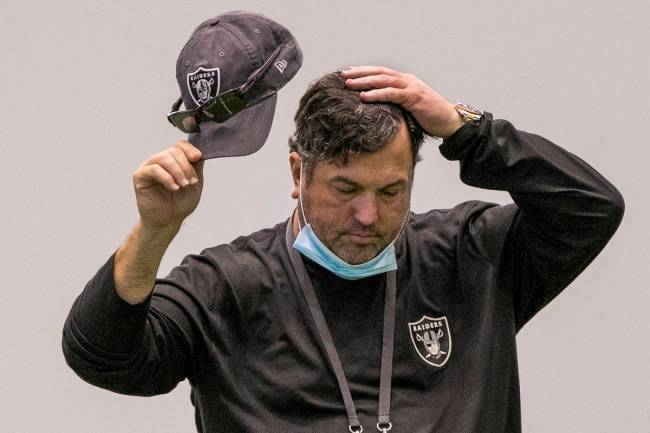 Las Vegas Raiders defensive coordinator Paul Guenther takes a moment to consider things during ...