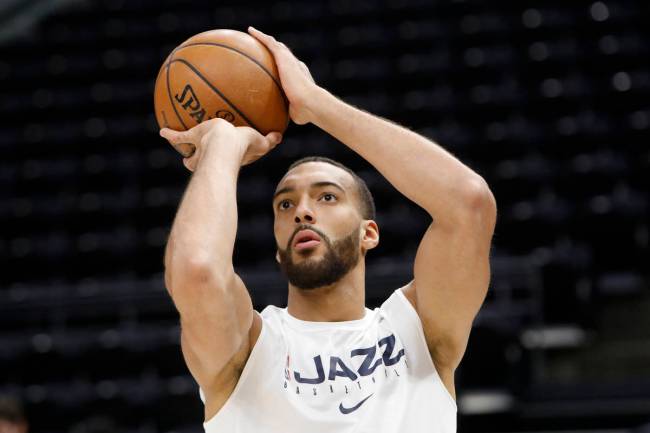 Utah Jazz's Rudy Gobert shoots the ball in a pregame warmup before an NBA basketball game again ...