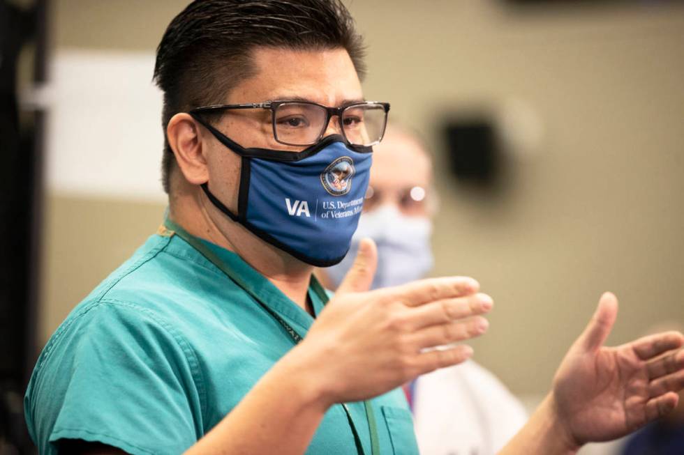 Dr. Myron Kung discusses the COVID-19 vaccine at the North Las Vegas VA Medical Center on Wedne ...