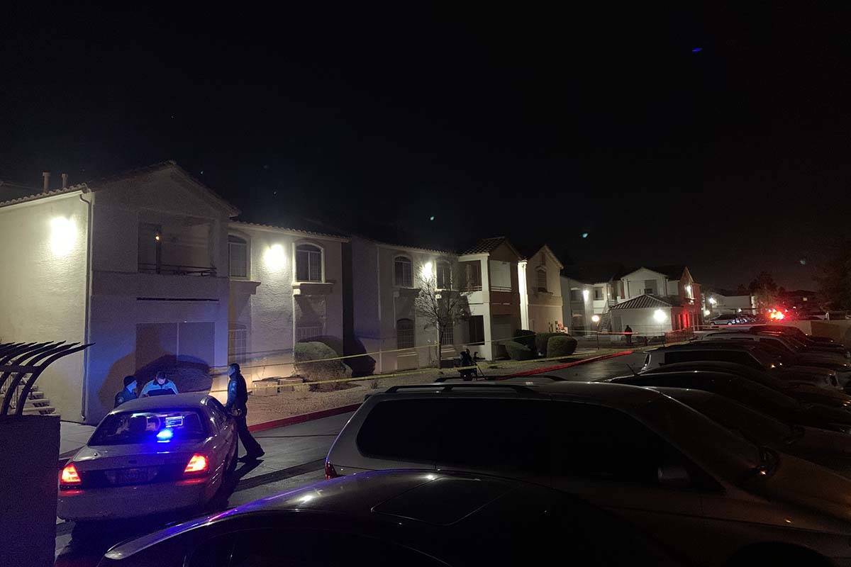 Police investigate a shooting on Wednesday, Dec. 16, 2020, at Pacific Legends East apartments, ...
