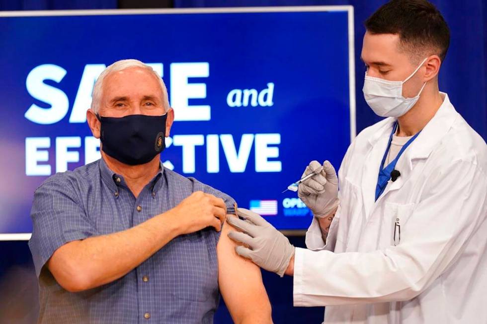 Vice President Mike Pence receives a Pfizer-BioNTech COVID-19 vaccine shot at the Eisenhower Ex ...
