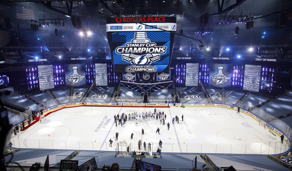 Tampa Bay Lightning players celebrate after defeating the Dallas Stars to win the Stanley Cup i ...