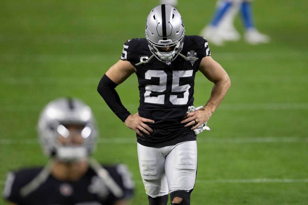 Raiders free safety Erik Harris (25) walks off the field after losing to the Los Angeles Charge ...