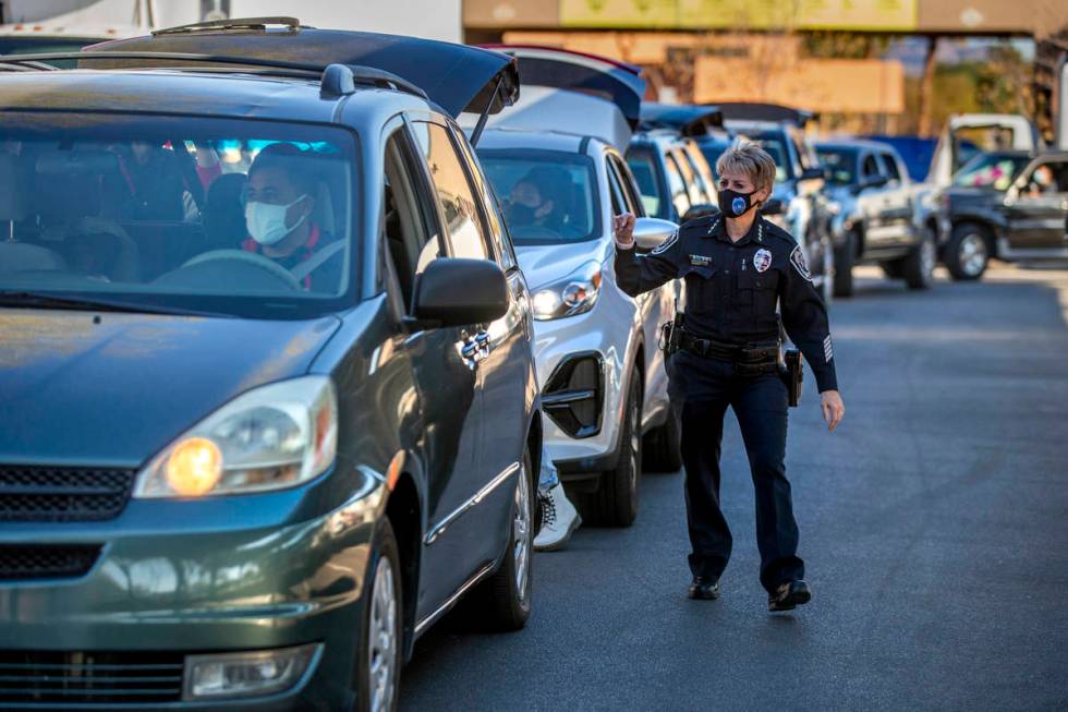 North Las Vegas Police Department Chief Pamela Ojeda directs traffic during the first NLVPD Hol ...