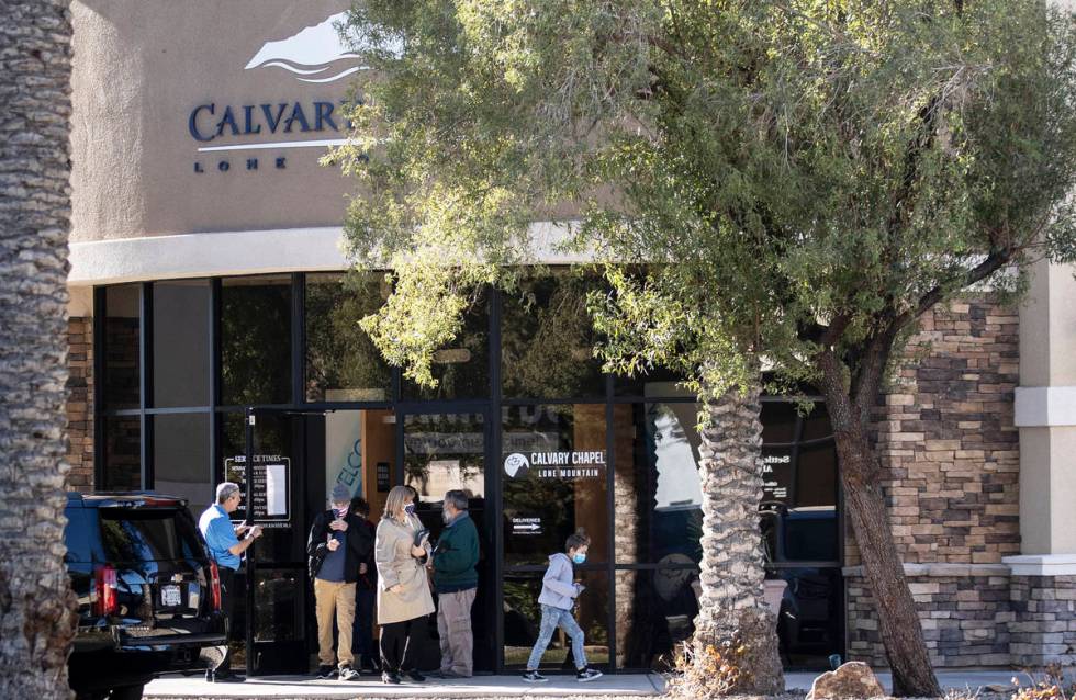 Church members exit Calvary Chapel Lone Mountain after the 9 a.m. service on Sunday, Dec. 20, 2 ...