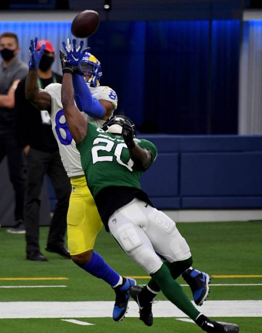 New York Jets free safety Marcus Maye (20) knocks a pass away against tight end Los Angeles Ram ...