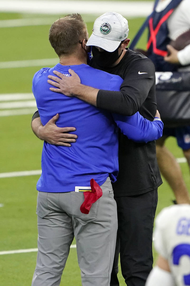 Los Angeles Rams head coach Sean McVay, left, hugs New York Jets head coach Adam Gase at the en ...