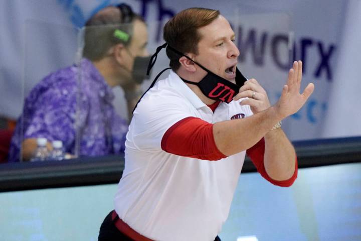 UNLV head coach T.J. Otzelberger directs his team in the first half of an NCAA college basketba ...