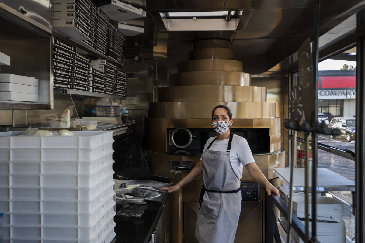 Chef Floriana Pastore is seen in the Signora Pizza Truck parked in the the Pinball Hall parking ...