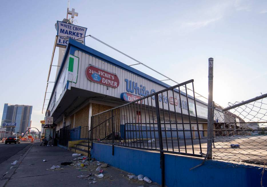 Trash is littered in front of the building where now-closed businesses Vickie's Diner and White ...