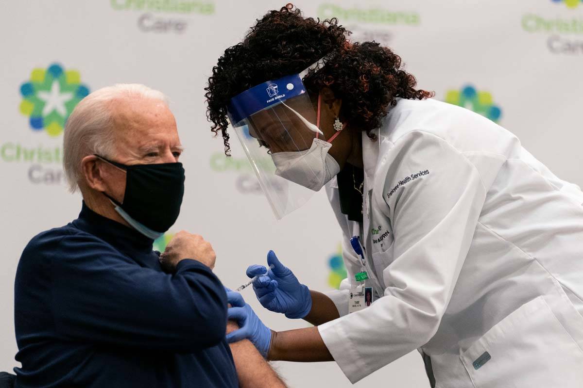 President-elect Joe Biden receives his first dose of the coronavirus vaccine from Nurse partiti ...