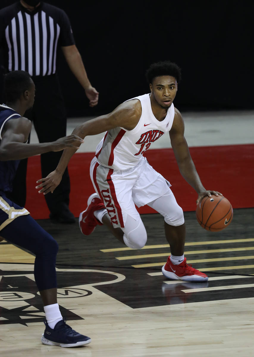 UNLV Rebels guard Bryce Hamilton (13) dribbles the ball against Montana State Bobcats during th ...