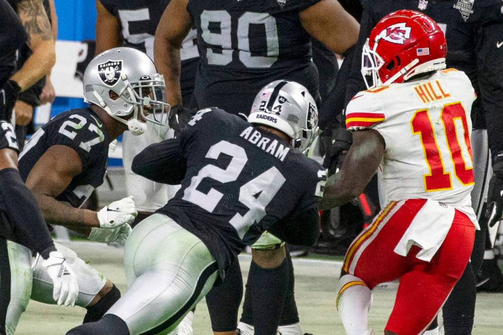 Las Vegas Raiders strong safety Johnathan Abram (24) lowers his shoulder to tackled Kansas City ...