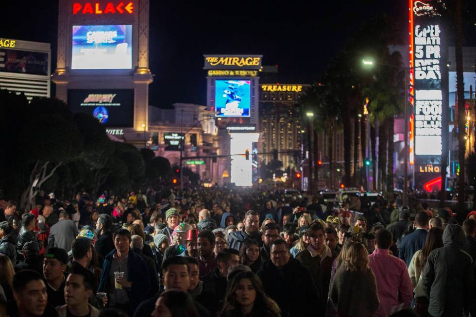 The Strip is packed with New Year's Eve goers on Tuesday, Dec. 31, 2019, in Las Vegas. (Benjami ...