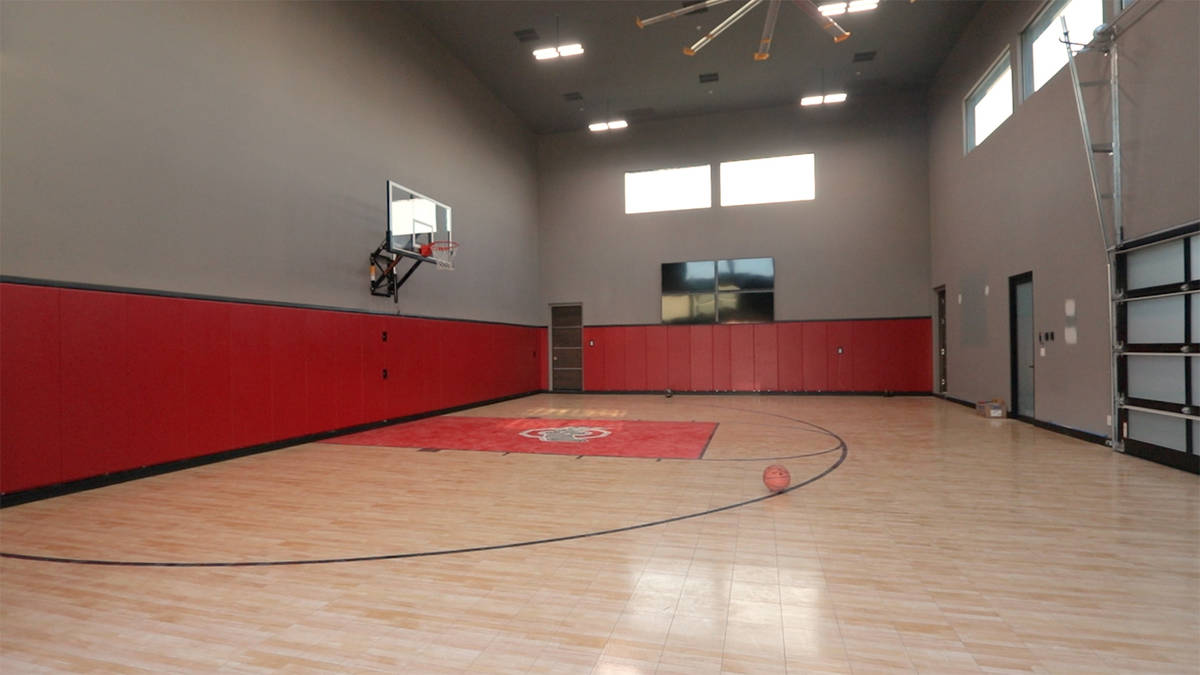 Forever Home Realty The estate has an indoor basketball court with electronic scoreboard and lo ...