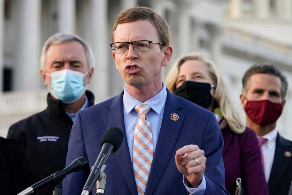 Rep. Dusty Johnson, R-S.D., speaks during a news conference with the Problem Solvers Caucus abo ...