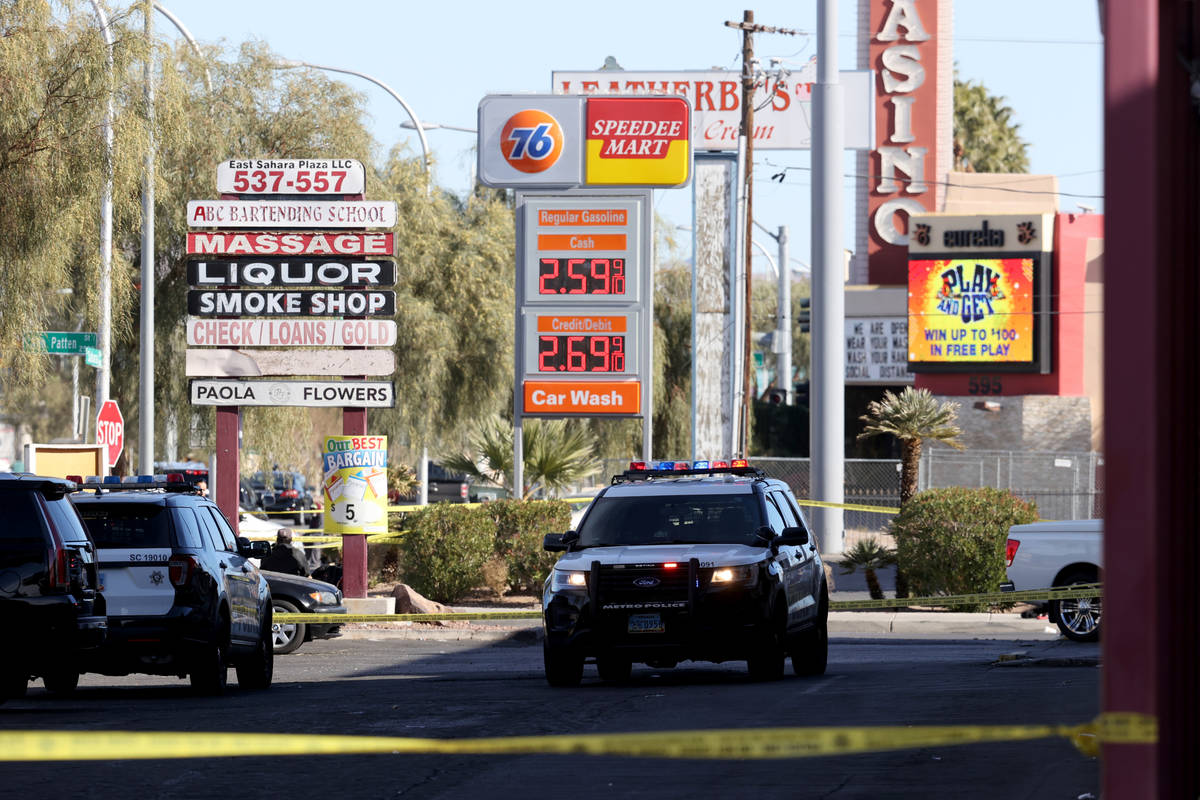 Las Vegas police investigate at the scene of a shooting on East Sahara Avenue near Paradise Roa ...