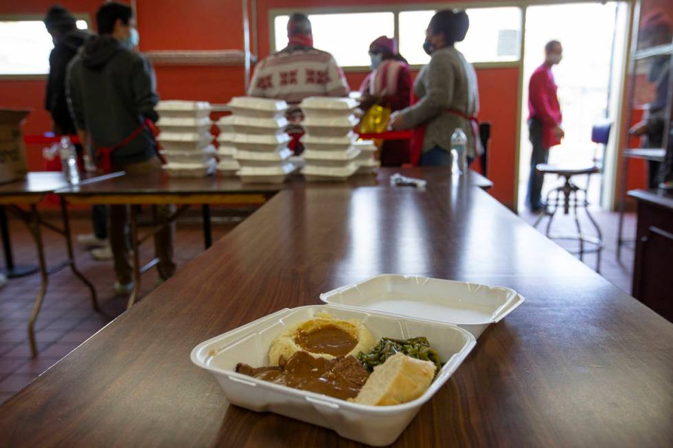 A Christmas meal of roast beef, mashed potatos with gravy and string beans is given to the home ...