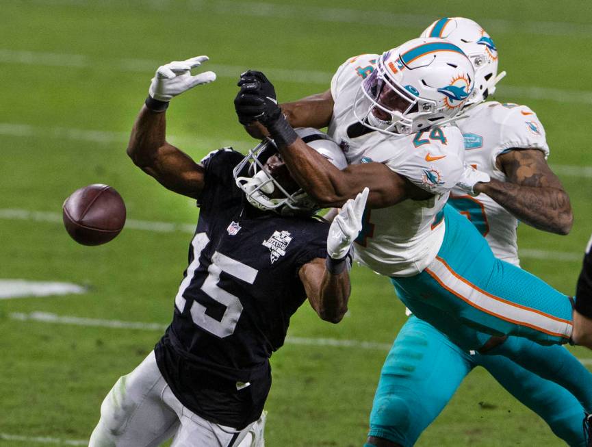 Miami Dolphins cornerback Byron Jones (24) deflects the ball intended to Raiders wide receiver ...