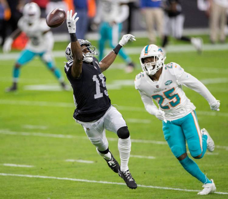 Raiders wide receiver Nelson Agholor (15) dives to try and make a catch over Miami Dolphins cor ...