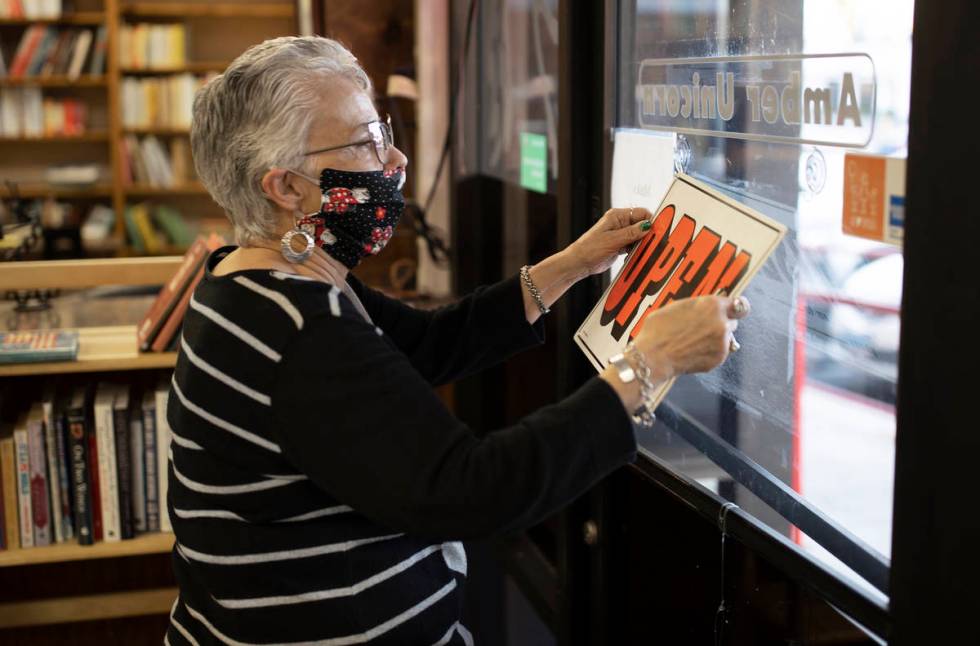 Myrna Donato, owner of Amber Unicorn Books, closes shop on the last business day at the Vegas l ...