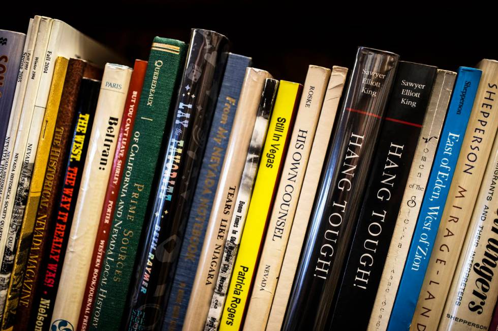 A row of books at Amber Unicorn Books on the last business day of the Vegas landmark on Sunday, ...