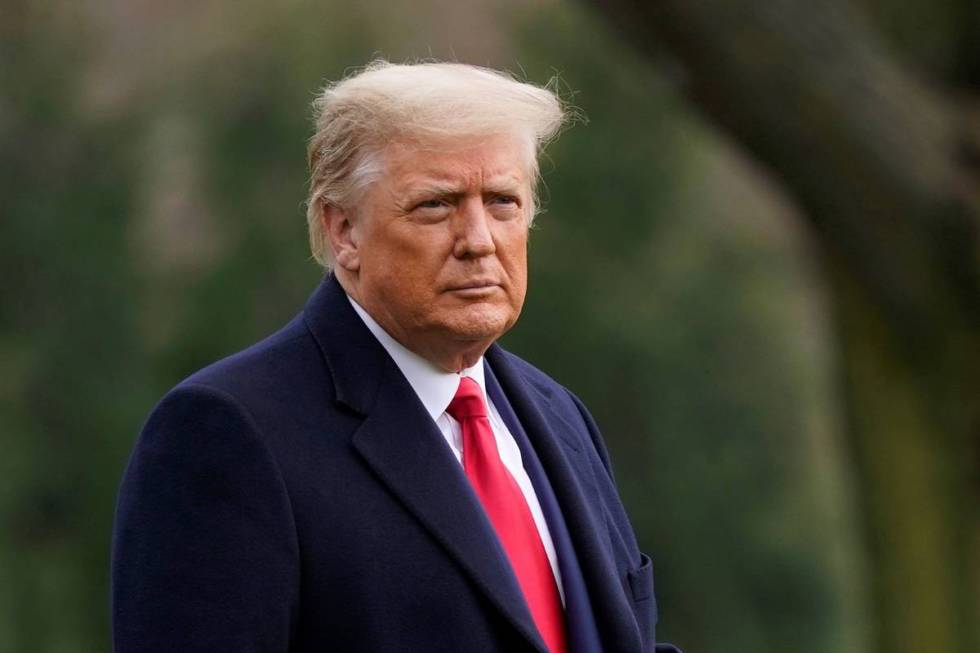 President Donald Trump walks on the South Lawn of the White House in Washington before boarding ...