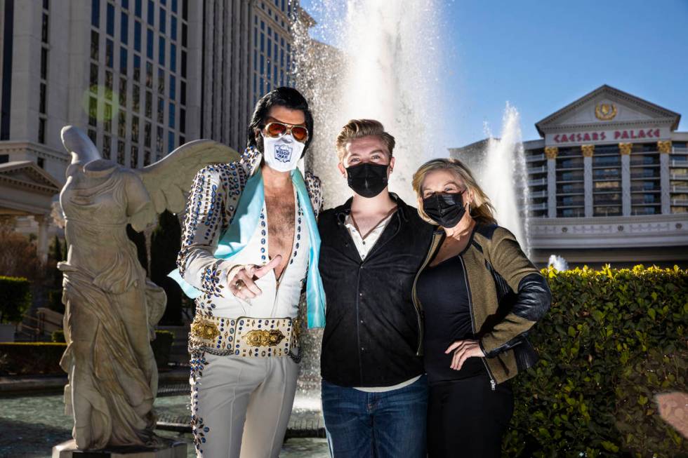 Cole Davis Duffy, center, poses with his dad, Brendan Paul, left, and his mom, Dee Dee Duffy, a ...