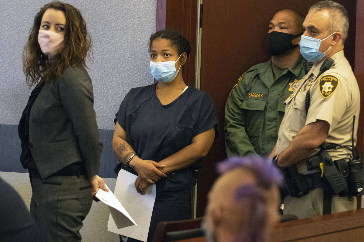 Amanda Sharp-Jefferson, second left, charged with murder in connection with the death of her 1- ...