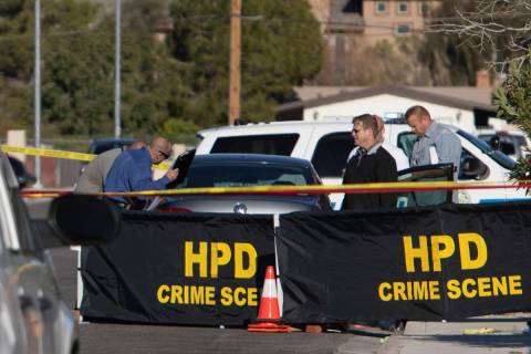 The Henderson Police Department investigates a homicide in a residential area near Lake Mead Pa ...