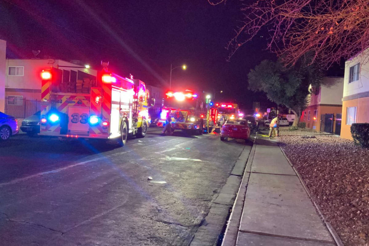 Crews battle a fire Tuesday, Dec. 29, 2020, at 4043 Silver Dollar Ave. in Las Vegas. (Las Vegas ...