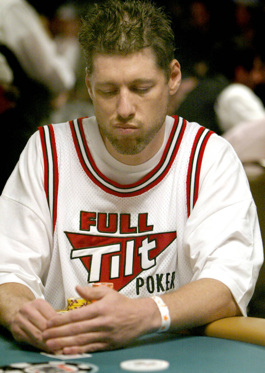 JANE KALINOWSKY/REVIEW-JOURNAL Huck Seed glances at his hand during the World Series of Poker ...