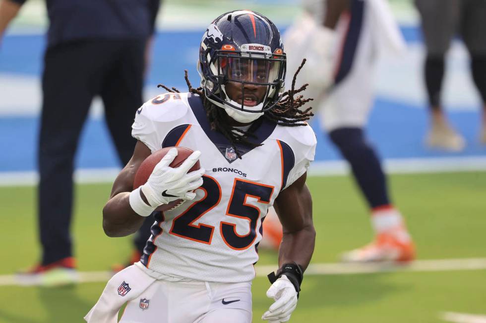 Denver Broncos running back Melvin Gordon (25) returns to the home of his former team for the f ...