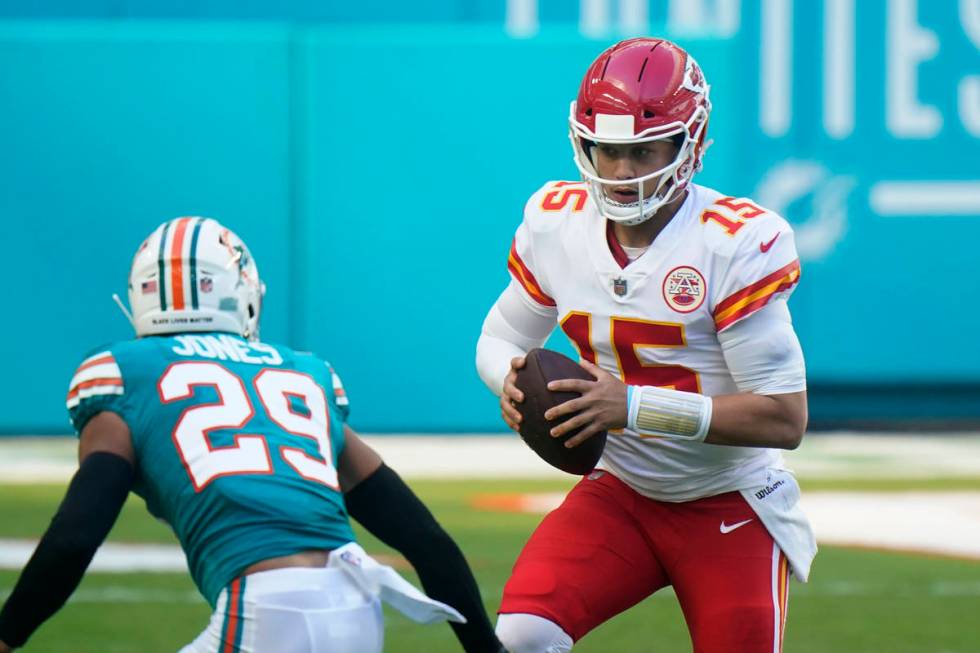 Kansas City Chiefs quarterback Patrick Mahomes (15) looks to pass the football during the first ...