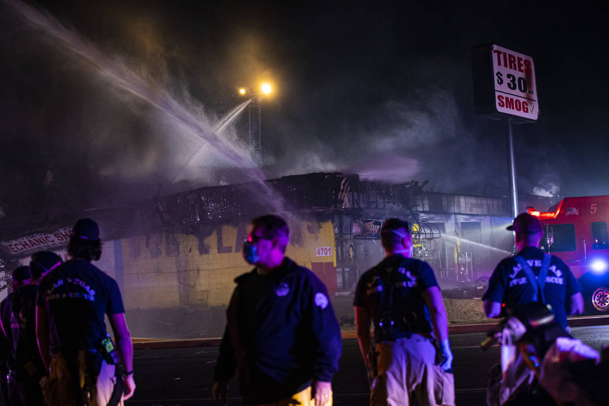 Las Vegas firefighters respond to a fire at a tire shop off Decatur Boulevard at Meadows Lane i ...