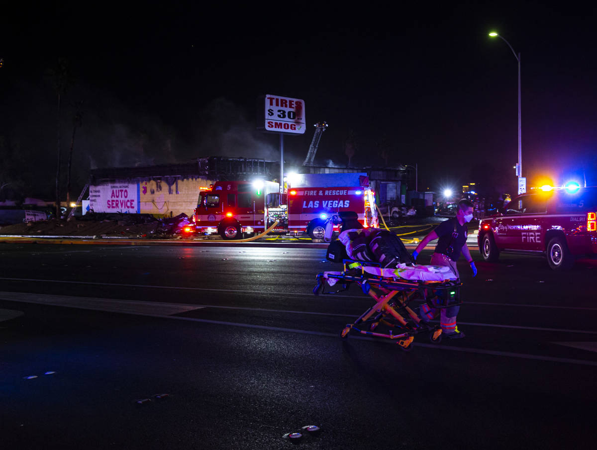 Las Vegas firefighters respond to a fire at a tire shop off Decatur Boulevard at Meadows Lane i ...