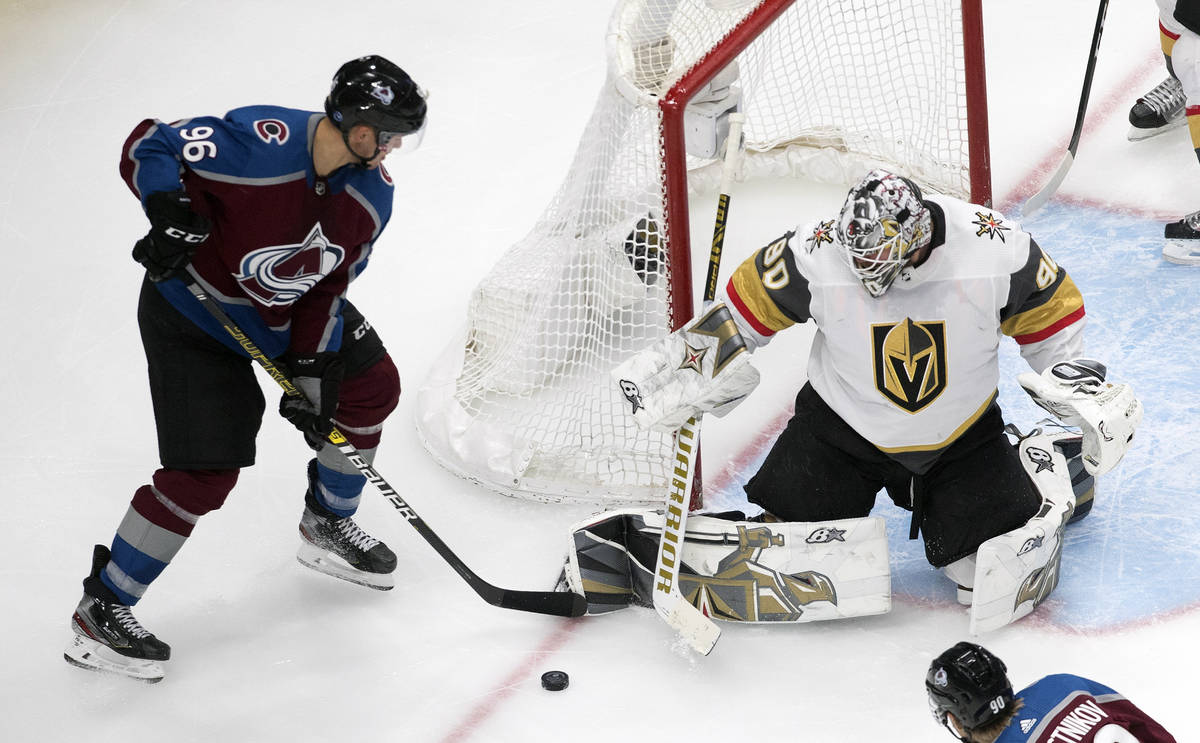 Colorado Avalanche's Mikko Rantanen (96) is stopped by Vegas Golden Knights goalie Robin Lehner ...