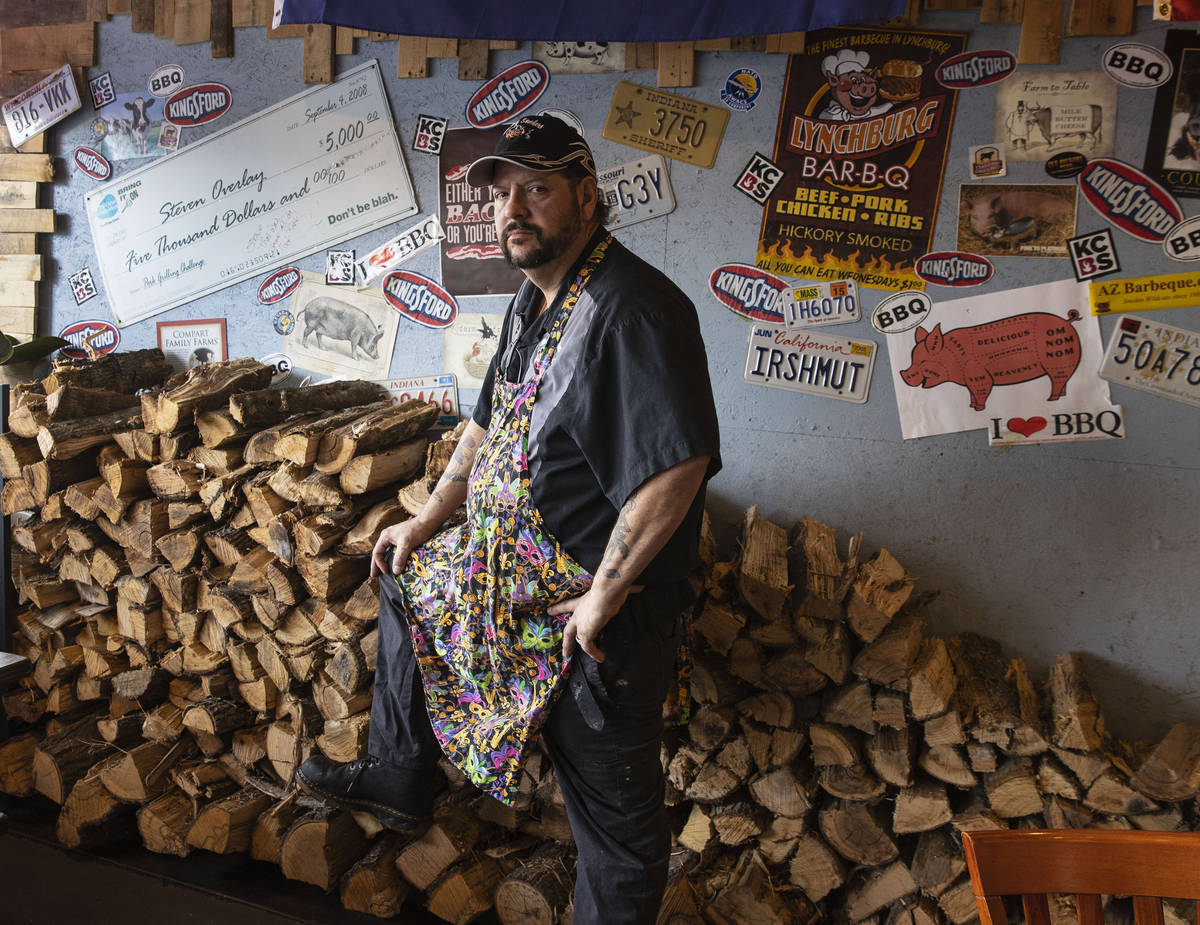 Steve Overlay, owner of Sin City Smokers Barbecue and Catering, poses for a photo at his Hender ...