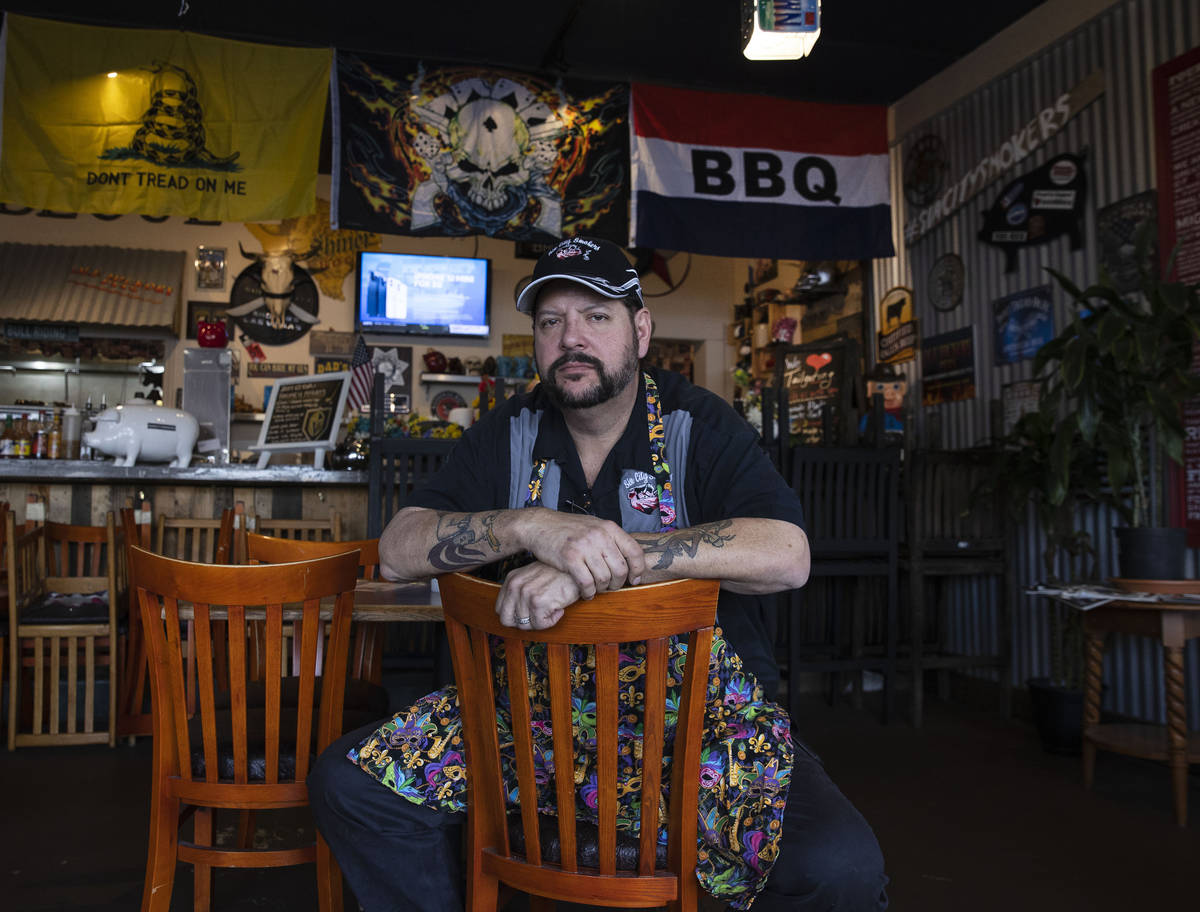 Steve Overlay, owner of Sin City Smokers Barbecue and Catering, poses for a photo at his Hender ...