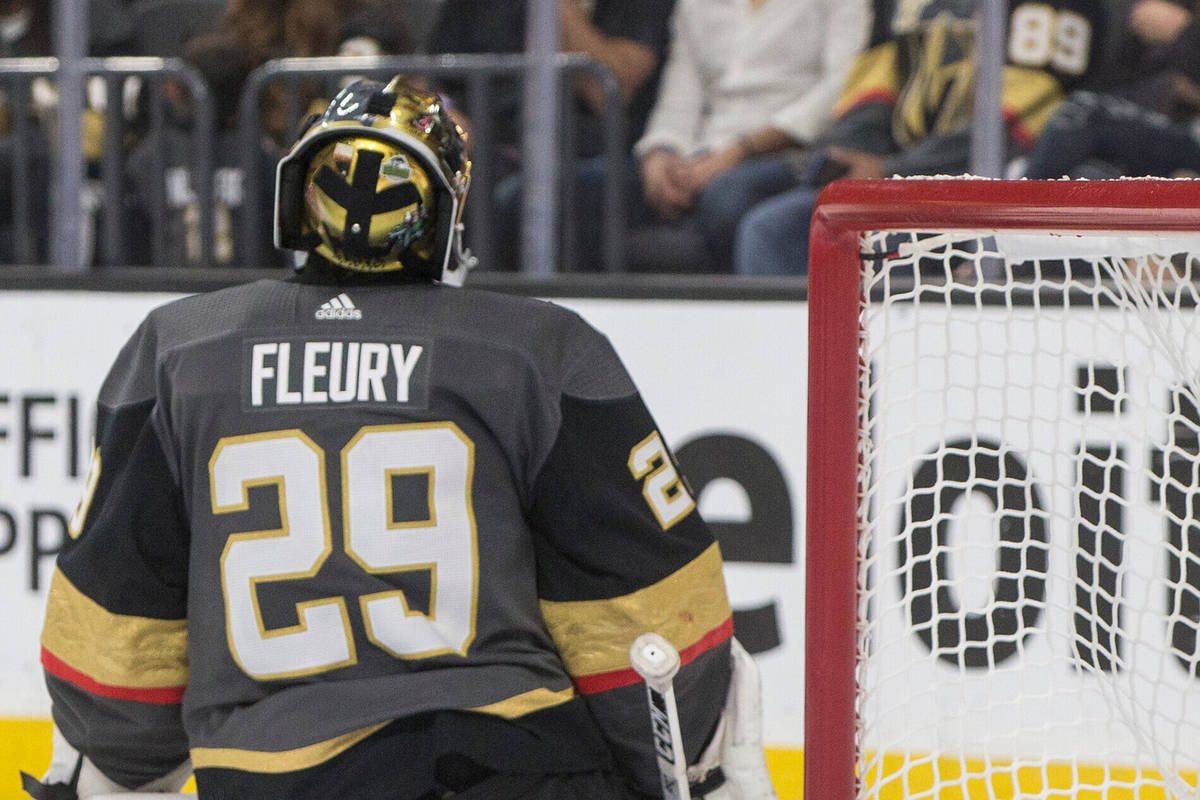 Golden Knights goaltender Marc-Andre Fleury (29) shrugs after giving up a second period goal du ...
