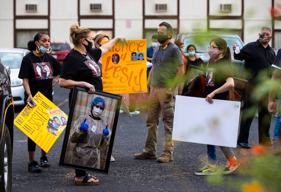 Aracely Palacio holds a picture of her daughter Lesly during a memorial gathering near the Long ...