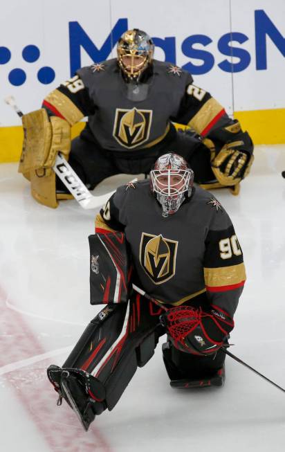 In this March 1, 2020, file photo, Vegas Golden Knights goaltender Robin Lehner (90) and Vegas ...