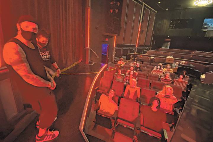 Sam Wills, aka Tape Face, shows the 25-foot distance between the stage and the audience at Harr ...