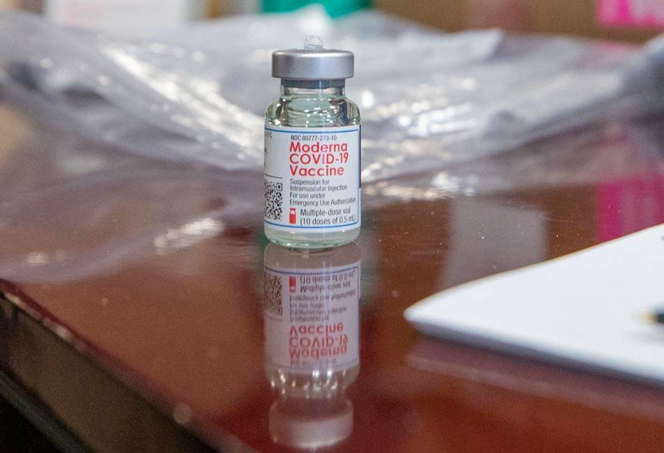 The North Las Vegas Fire Department administers its first batch of a COVID-19 vaccines to first ...