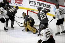 Vegas Golden Knights goaltender Marc-Andre Fleury (29) blocks a shot from forward Alex Tuch (89 ...