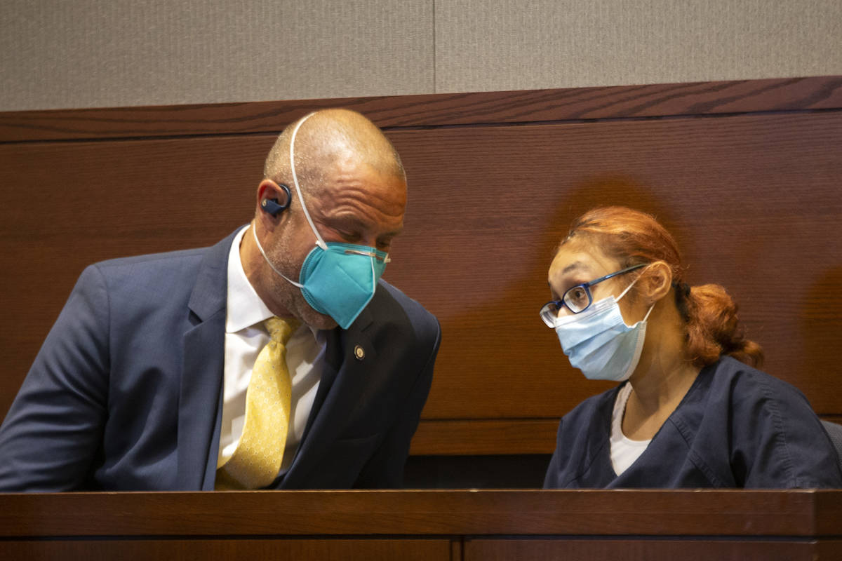 Jasmin Vargas communicates with her attorney, David Fischer, during a court hearing at the Regi ...